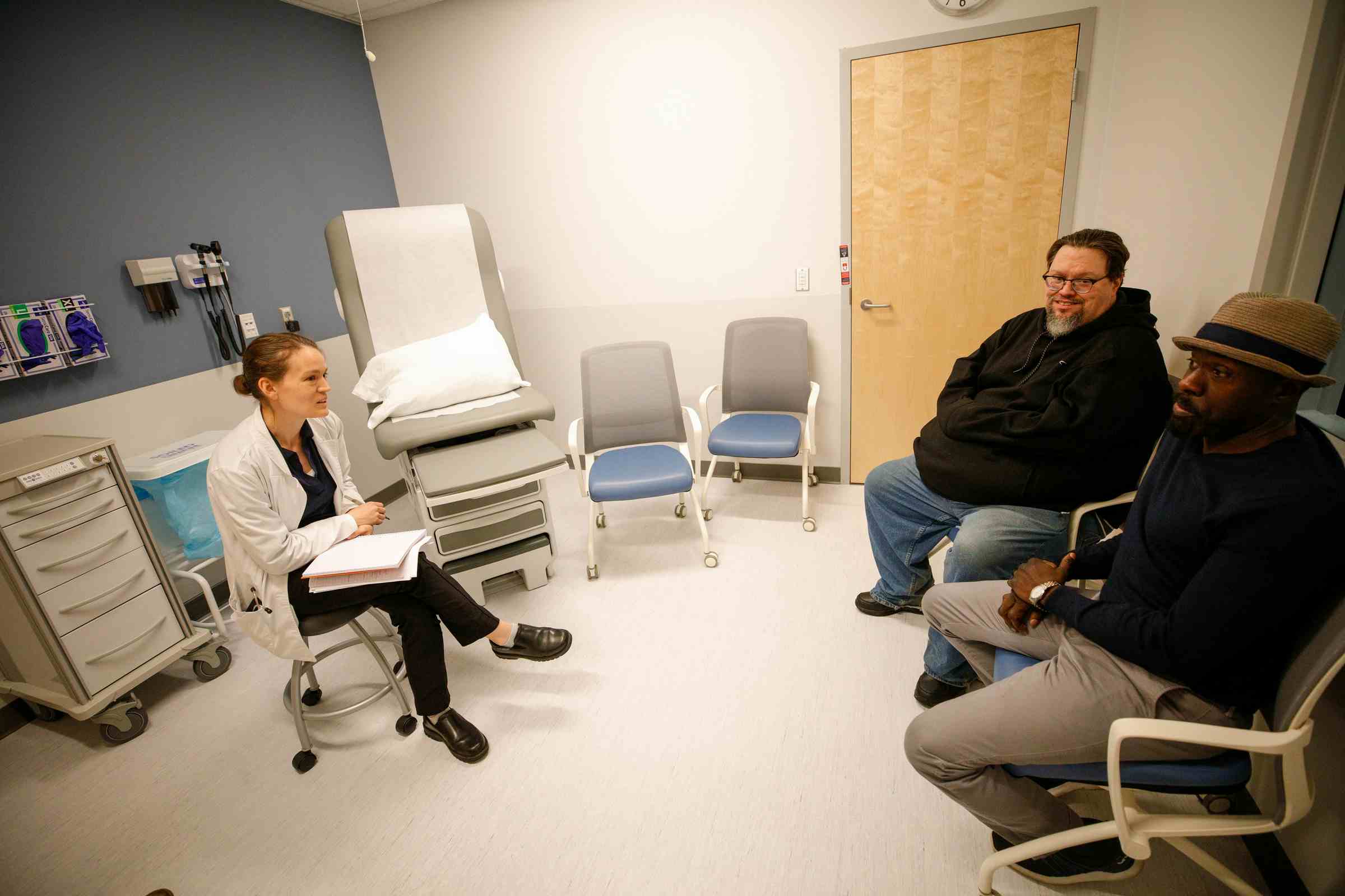 Nurse Practitioner talking to a patient.