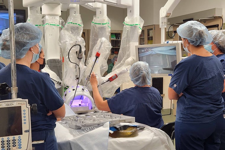 Robotics image of students in the OR