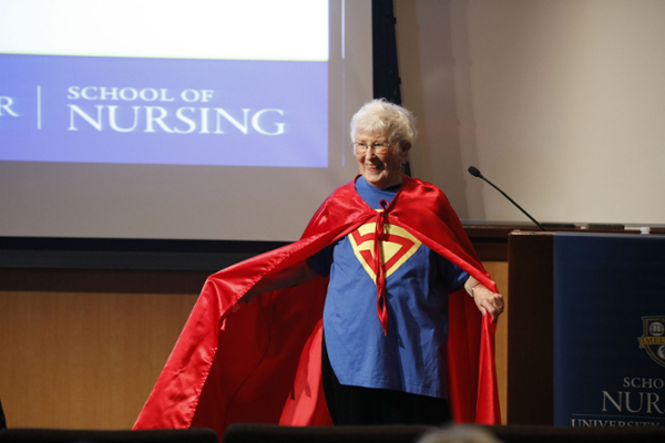 Loretta Ford, nurse practitioner, in superhero cape