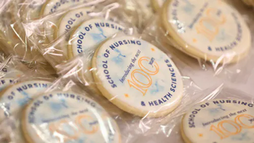 School of Nursing &amp; Health Sciences writing on cookie