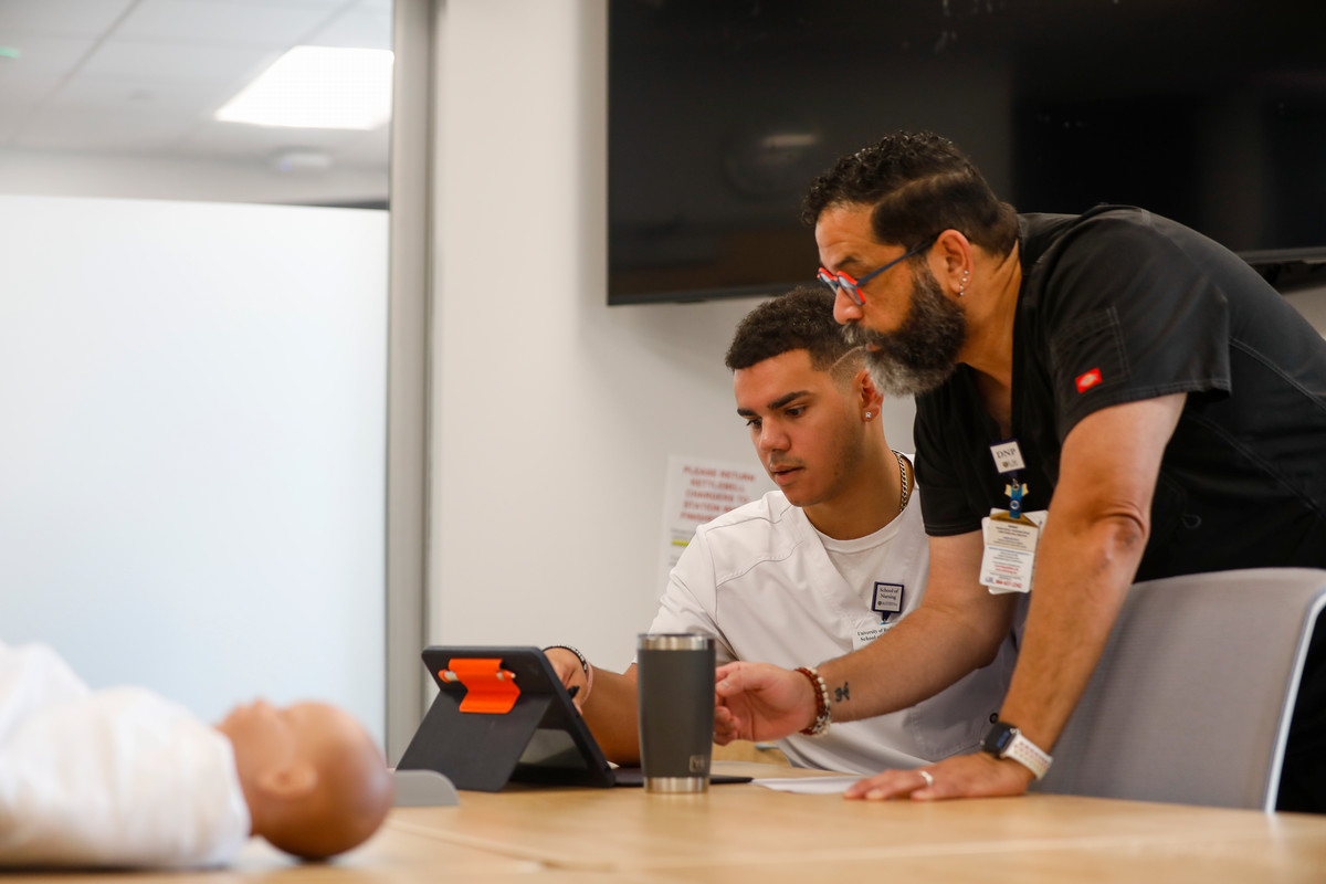 Program co-director Luis Rosario-McCabe instructs an accelerated student