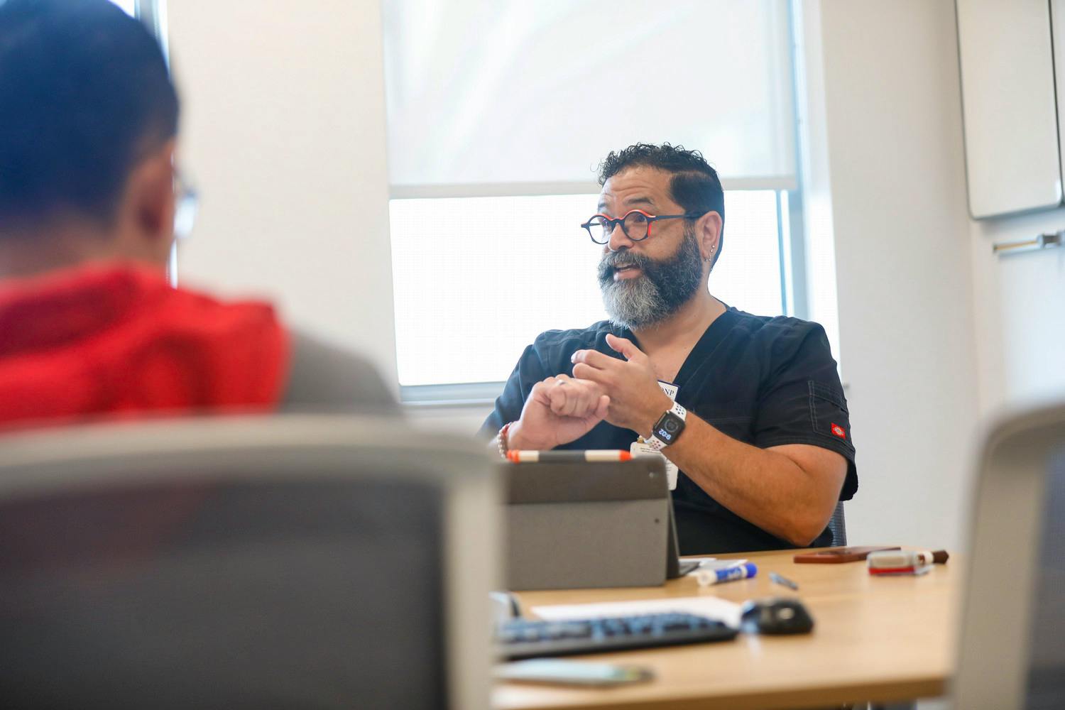 Faculty member instructs students