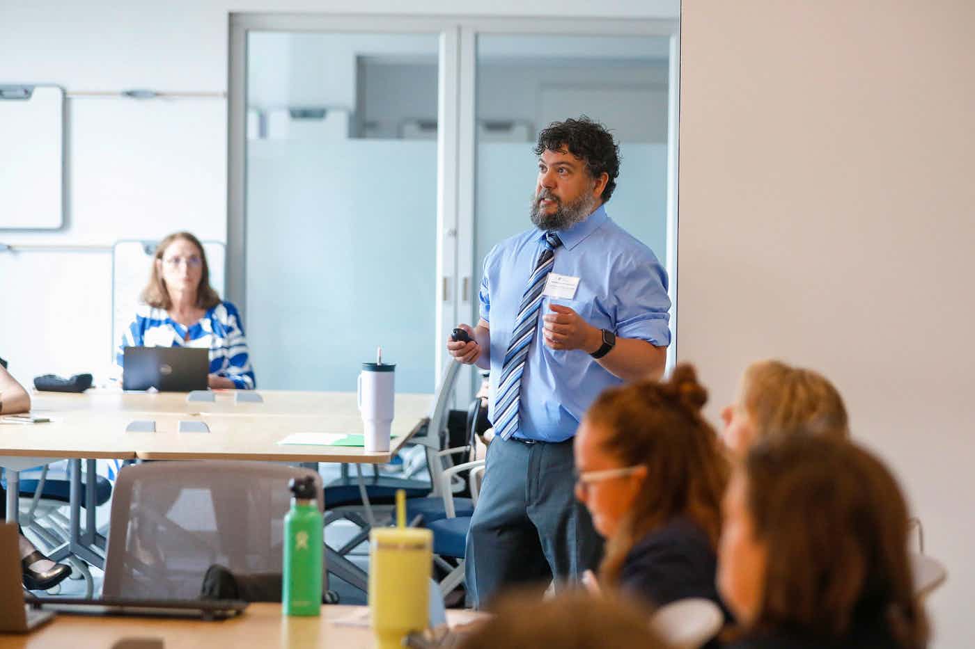 Faculty member instructing in a classroom