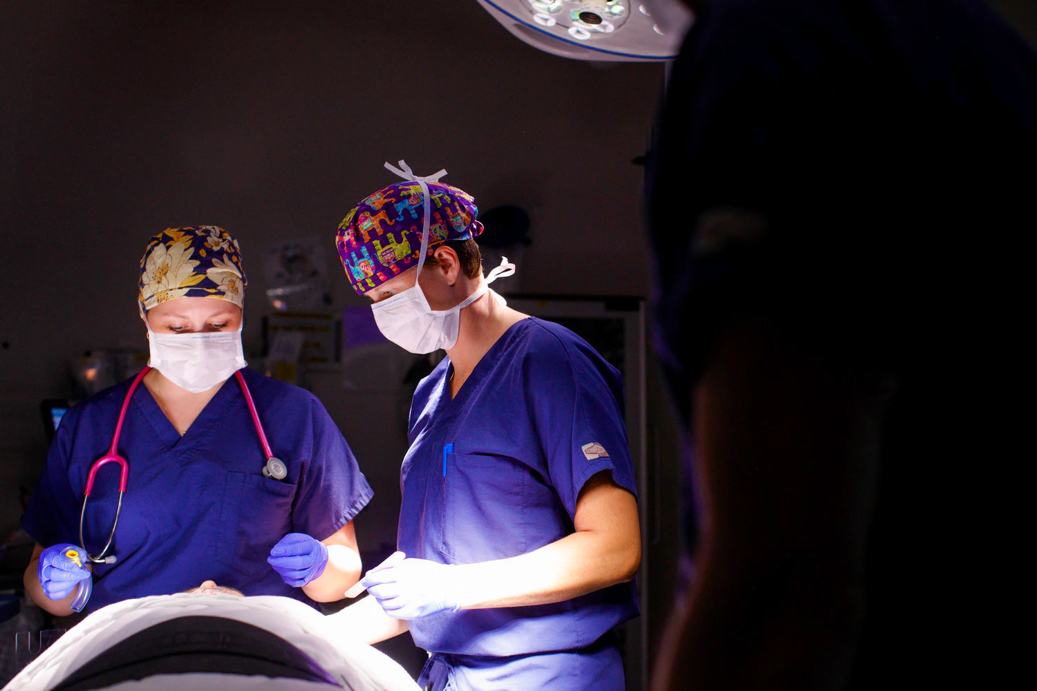 Program director Alison Henry and CRNA in OR