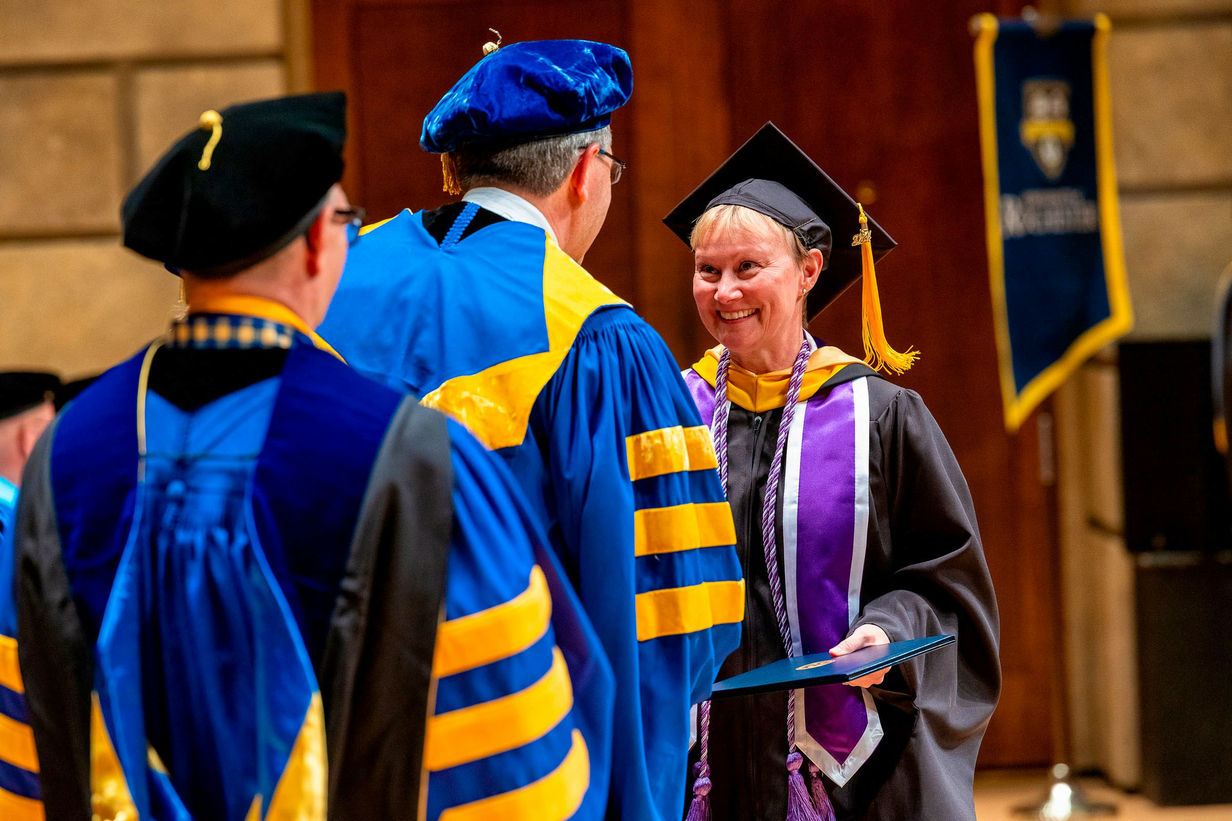 LHCS graduate receiving diploma
