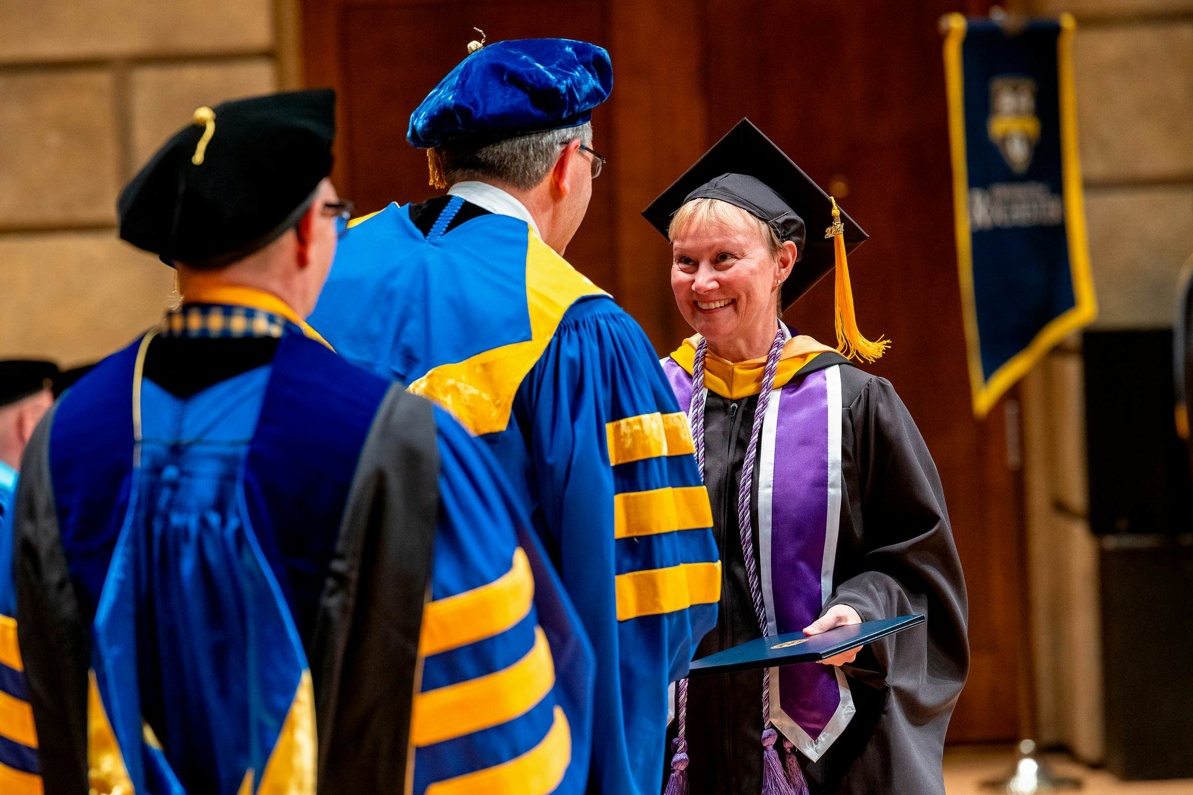 LHCS graduate receiving diploma