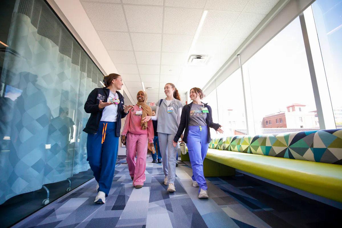 Nursing students walk through Helen Wood Hall's experiential learning expansion