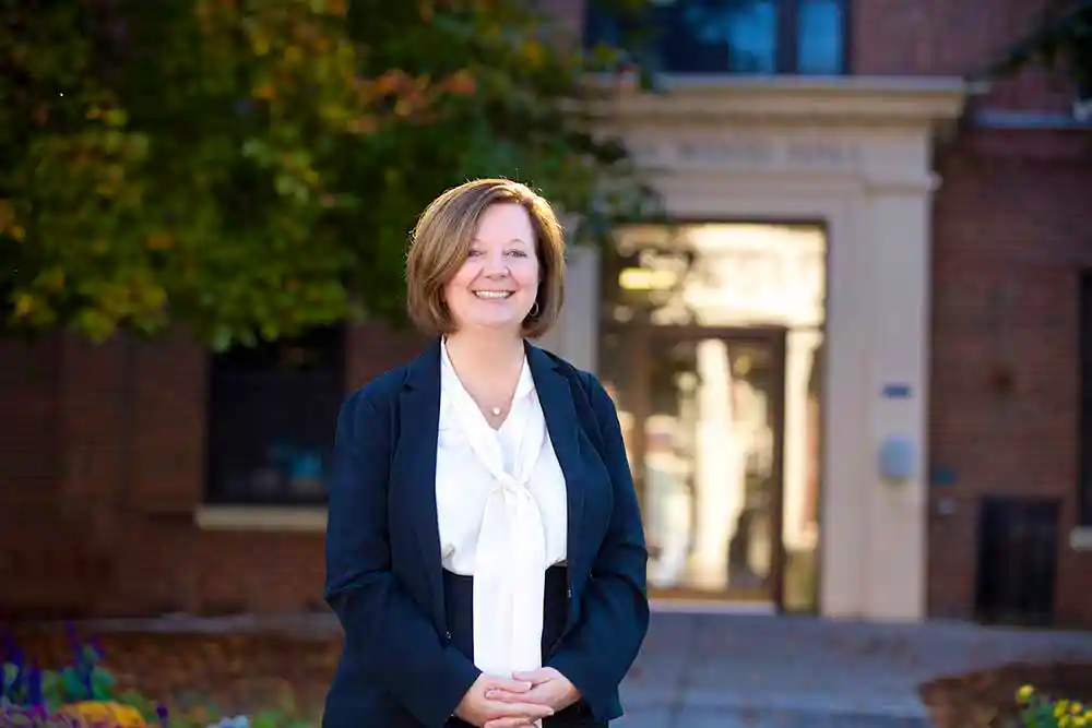 Lisa Kitko stands outside the School of Nursing.