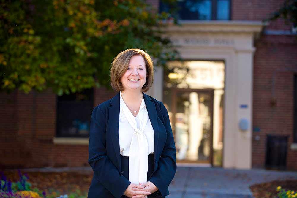 Lisa Kitko stands outside the School of Nursing.
