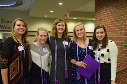 Smiling students at induction