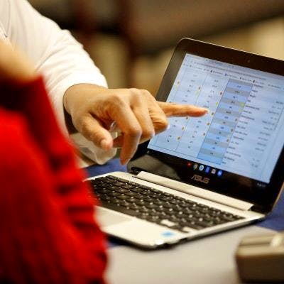 person showing a client their Biometric results