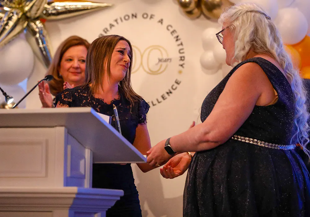 Chelsea Spaid receiving the Scholarship Innovation in Practice Award