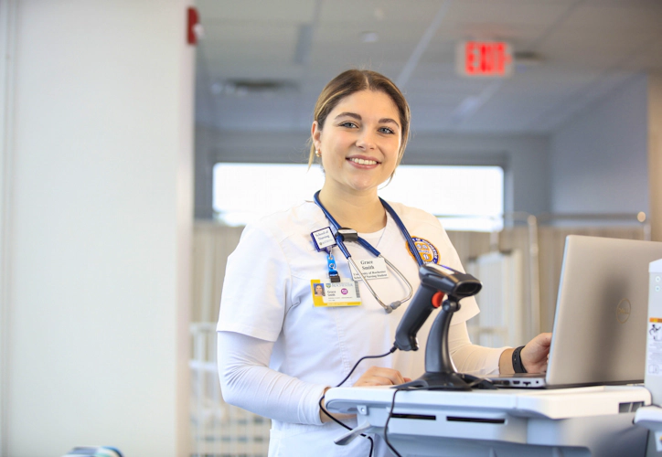 Grace Smith, nurse smiling at a camera